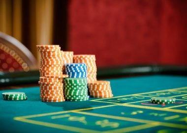 Live casino dealer and gaming table setup